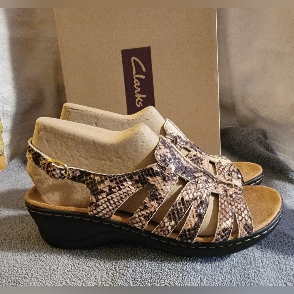 Like New-Clarks sandals. cool snakeskin print and comfy wedge sole. Size 8.5 - Picture 5 of 8